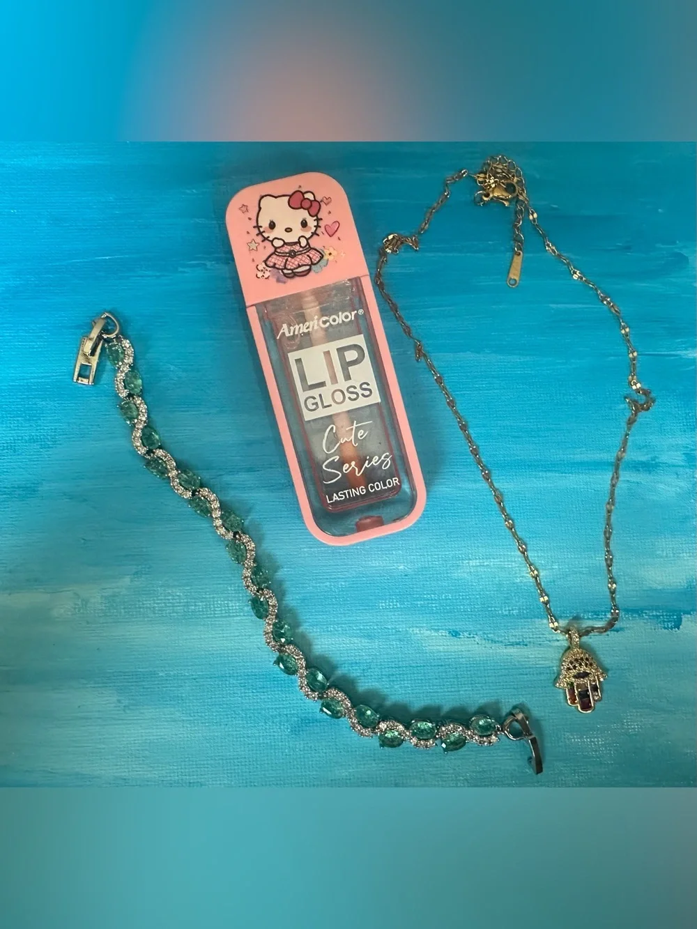 Hello Kitty Pink Lip Gloss and Jewelry Bundle